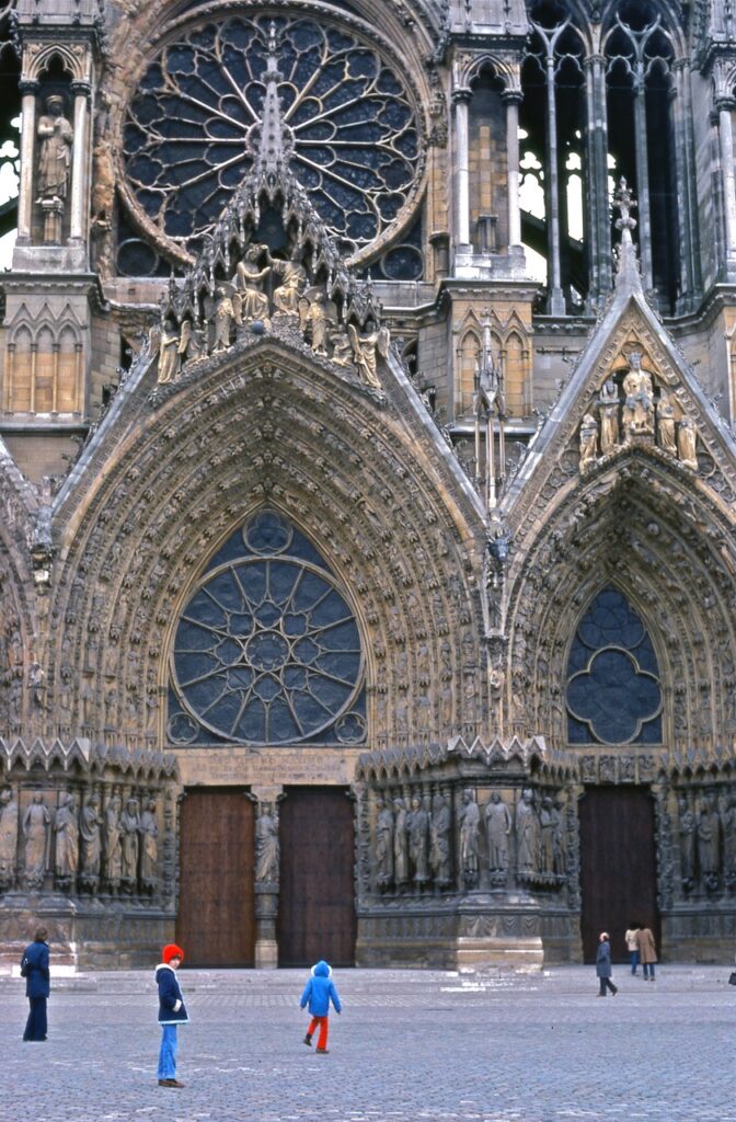 image of children looking at a cathedral door
